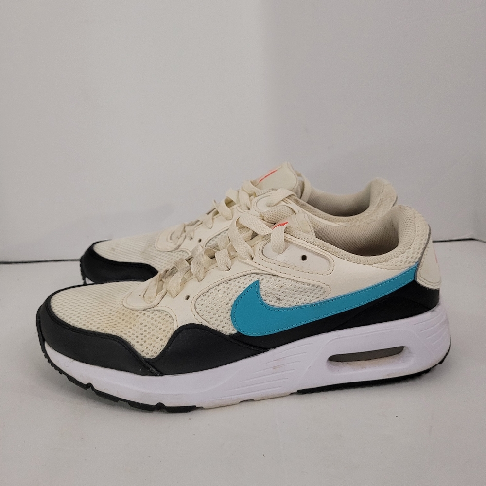 Nike Women's Cream Black Sneakers with Teal Swoosh